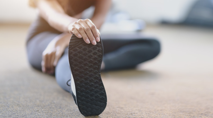 Women stretching after running a marathon