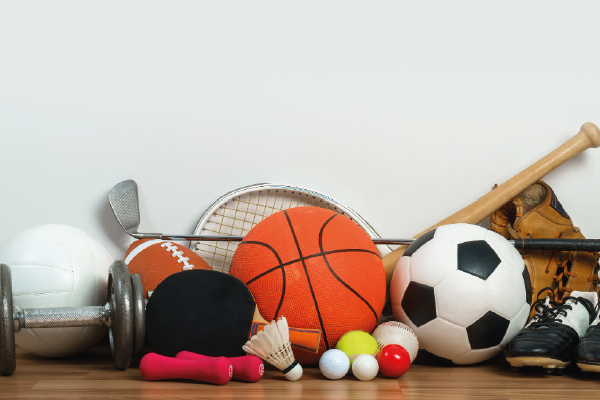 Sports Equipment on wooden background